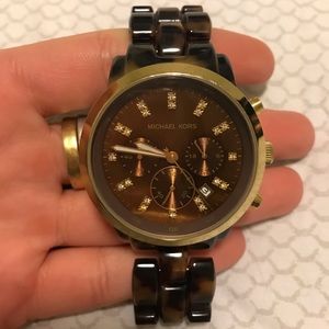 Gently used Michael Kors watch tortoise chunky